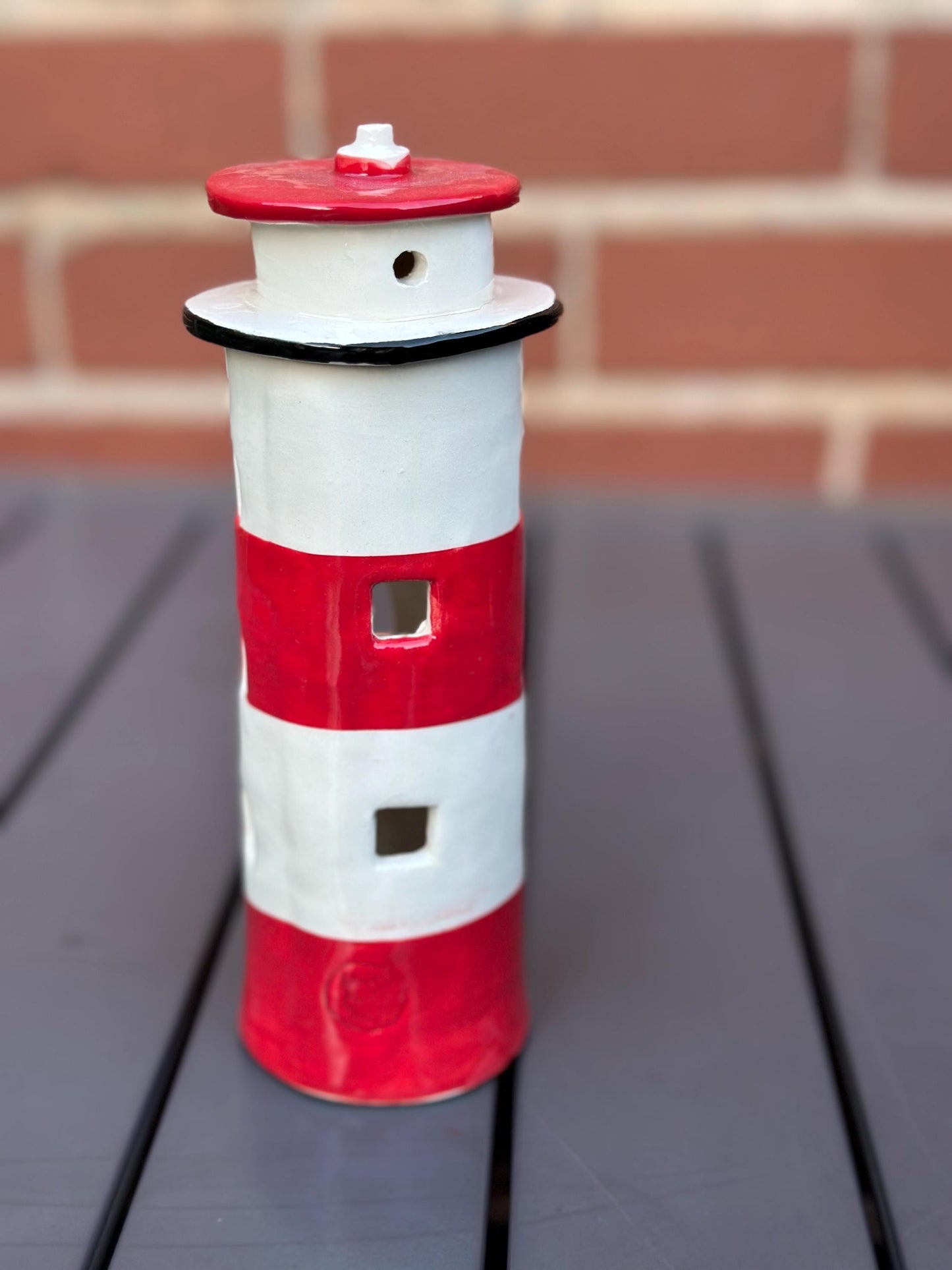 Handmade Ceramic Tealight Lighthouse.