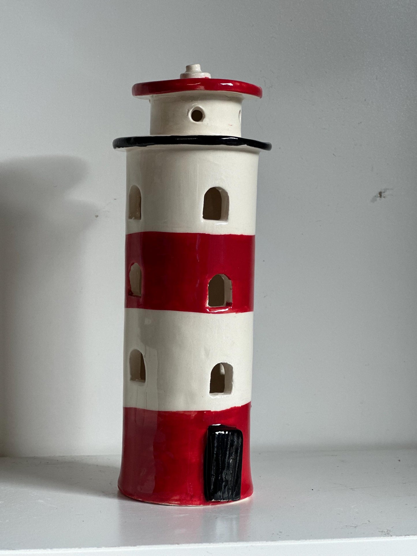 Handmade Ceramic Tealight Lighthouse.
